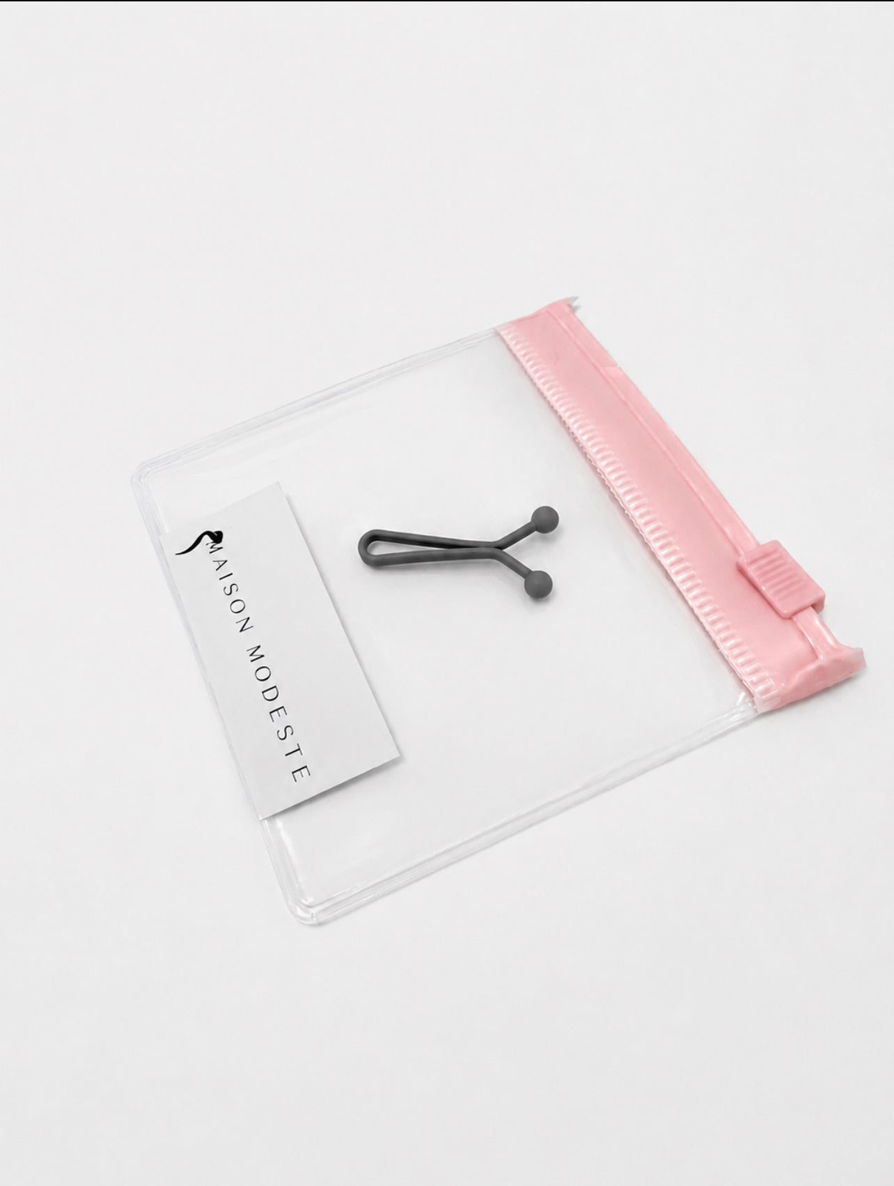 Pince anti-trou gris